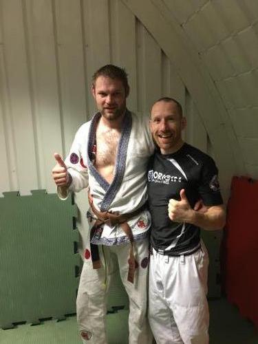 Receiving brown belt from Ian Malone 2017