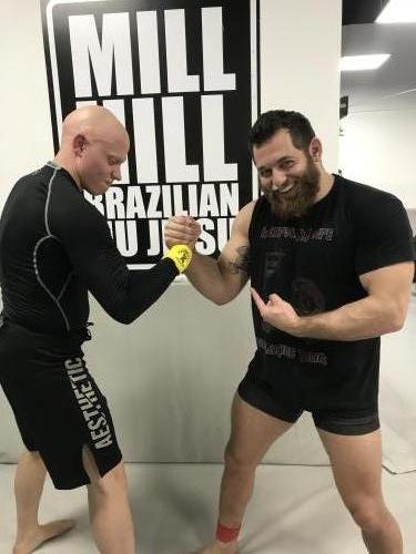 Receiving my yellow band from Dan Strauss in his nogi grappling system