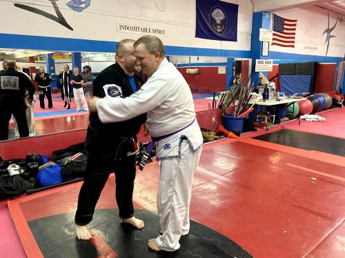 A picture from my 4th stripe being awarded on my purple belt by Professor Paul Byars