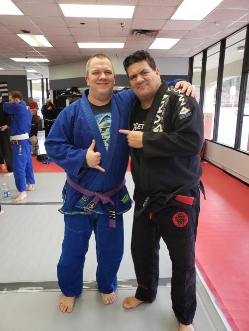 Professor Rigan Machado and I during an early 2020 seminar I attended.
