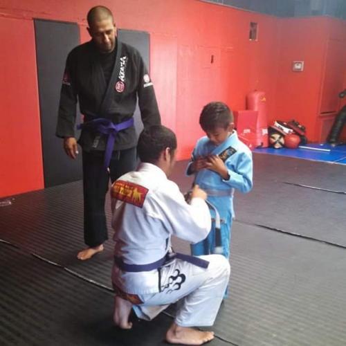 Purple belt · October 14, 2014 · Promoted by ERNEST ARGUELLO