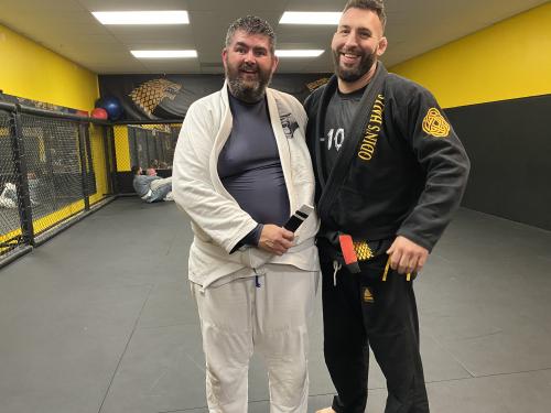 Me receiving my 1st stripe on my White Belt.