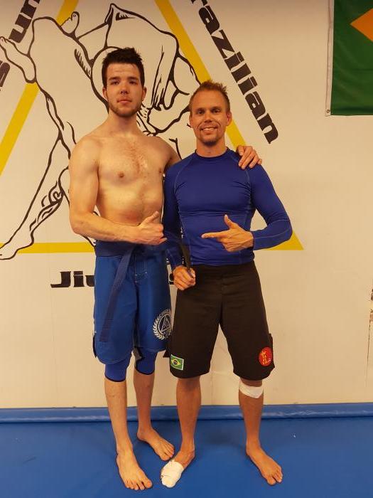 From my "Blue Belt" promotion where Robert did not let me put the RashGuard back on before the picture XD