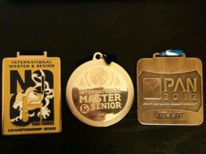 IBJJF 2008 and 2010 Master’s Nogi worlds (Gold). 2012 Pans bronze (Unable to find my 2006 Pans Bronze medal)