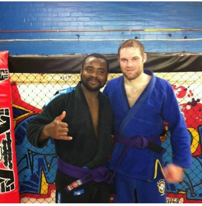 Kafui And I receiving purple belts 2013