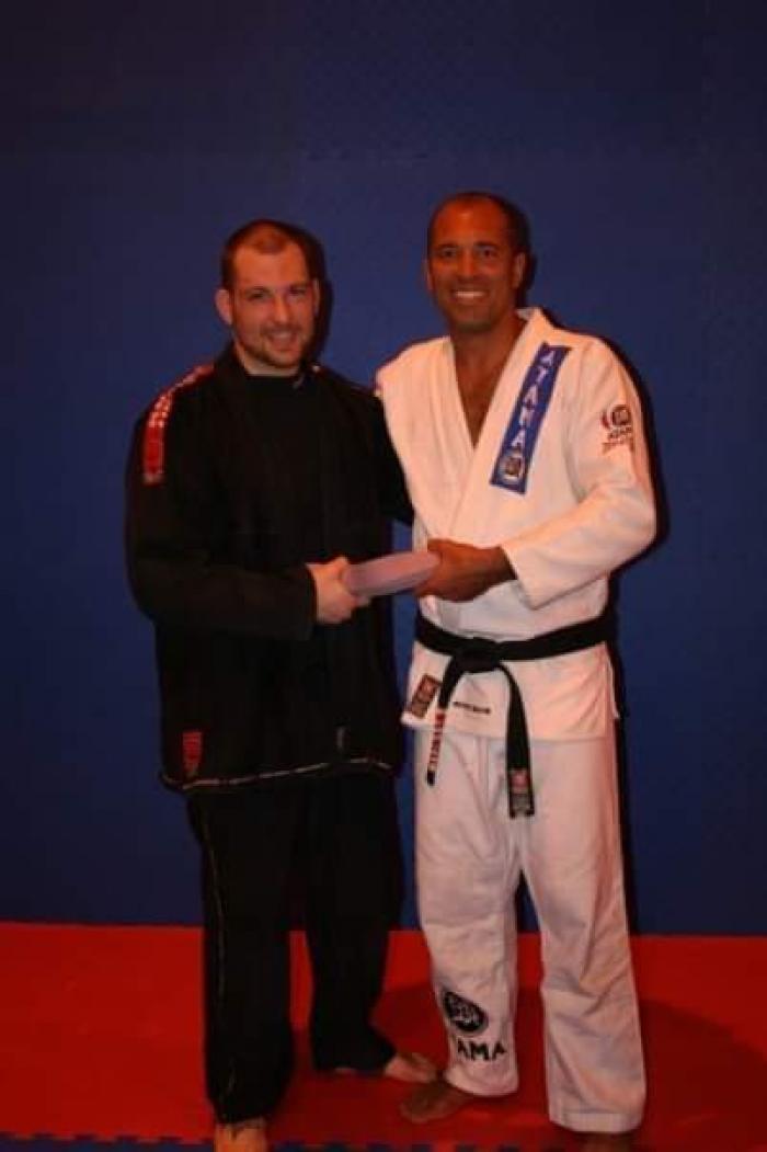 Purple belt · June 20, 2009 · Promoted by Royce Gracie