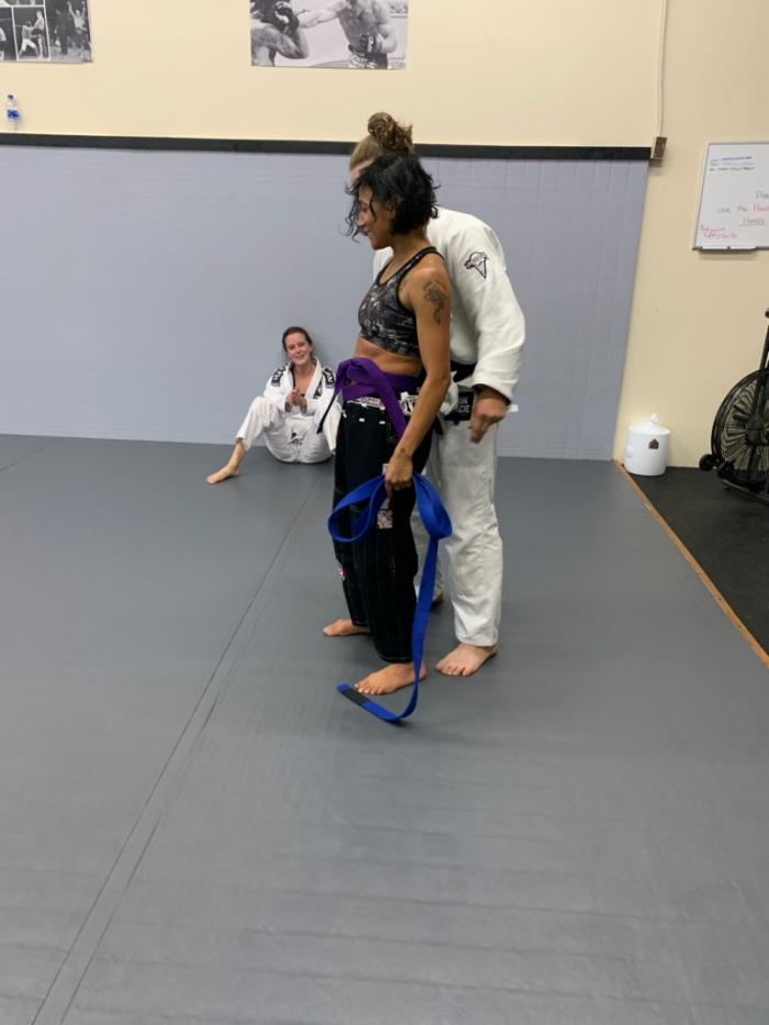 Giving Angela her Purple Belt