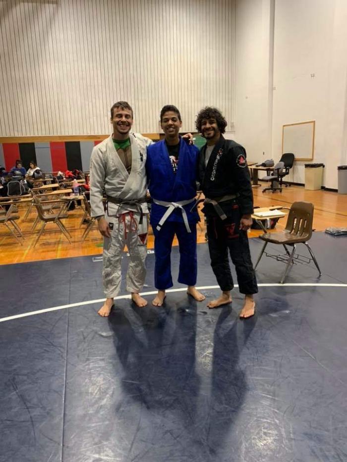 Joey Haus and my coach Eric Medina giving me my first stripe ever.