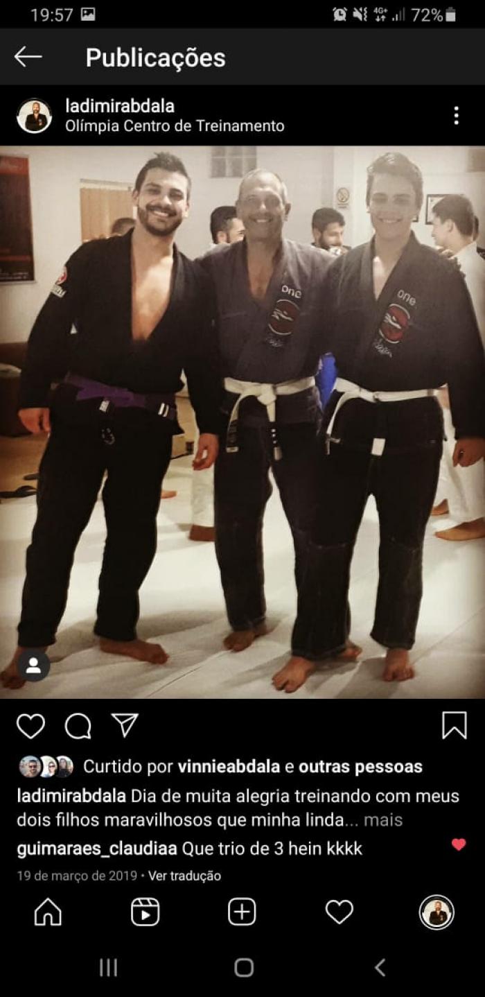 Me and my two sons, Vinicius (purple belt) and Mateus (White belt)
