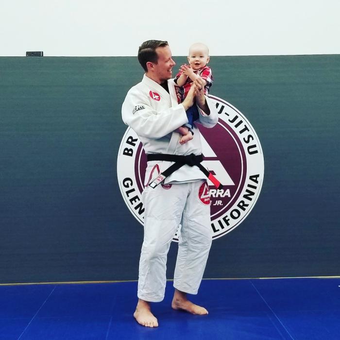 Black Belt Promotion Holding My Son