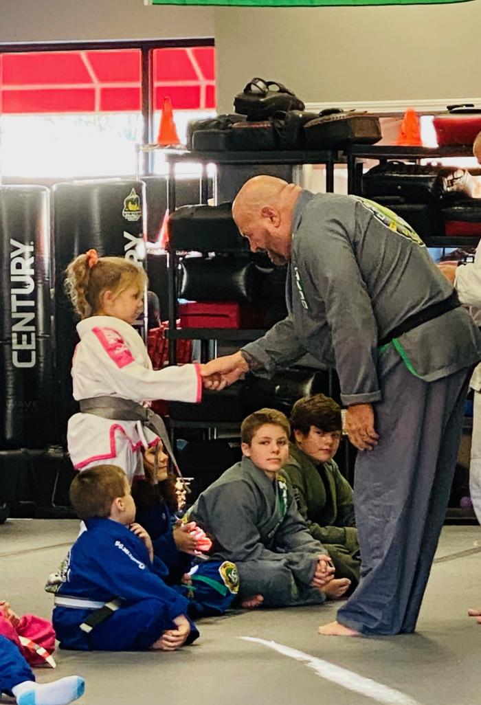 Getting promoted to grey belt.
