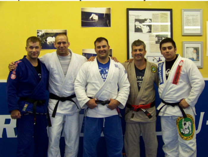 Getting my black belt. Sept 5, 2009 with Manny Galvan and King Webb. Instructor: William Vandry with Carlos Machado