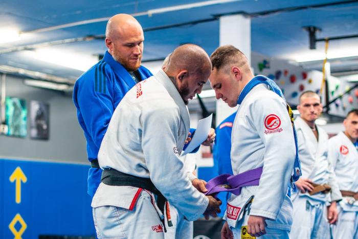 Getting my purple belt from Richie Quan and Norma Wessels