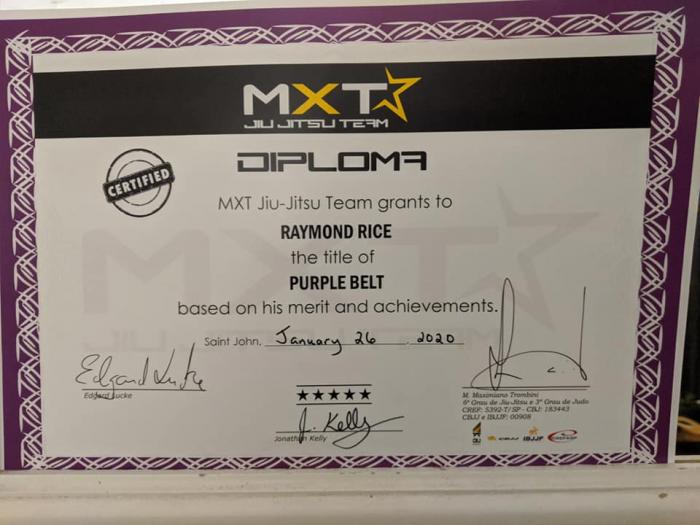 Purple belt · Promoted by Jon Kelly