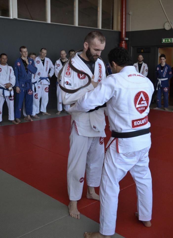 Prof Carlos Lemos Jr promotes me to black belt.
