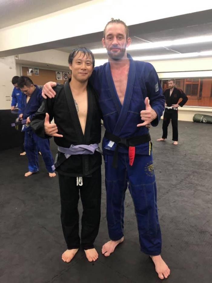 Purple belt · August 30, 2019 · Promoted by Houng Xin Kai