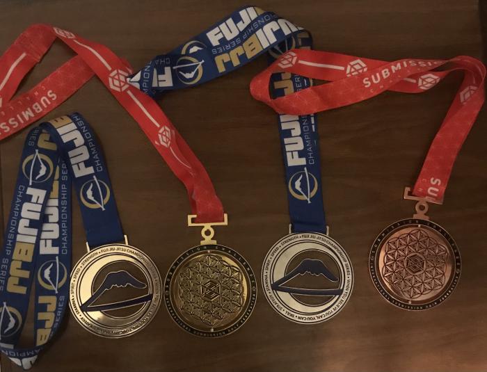 Medals earned at white belt.
