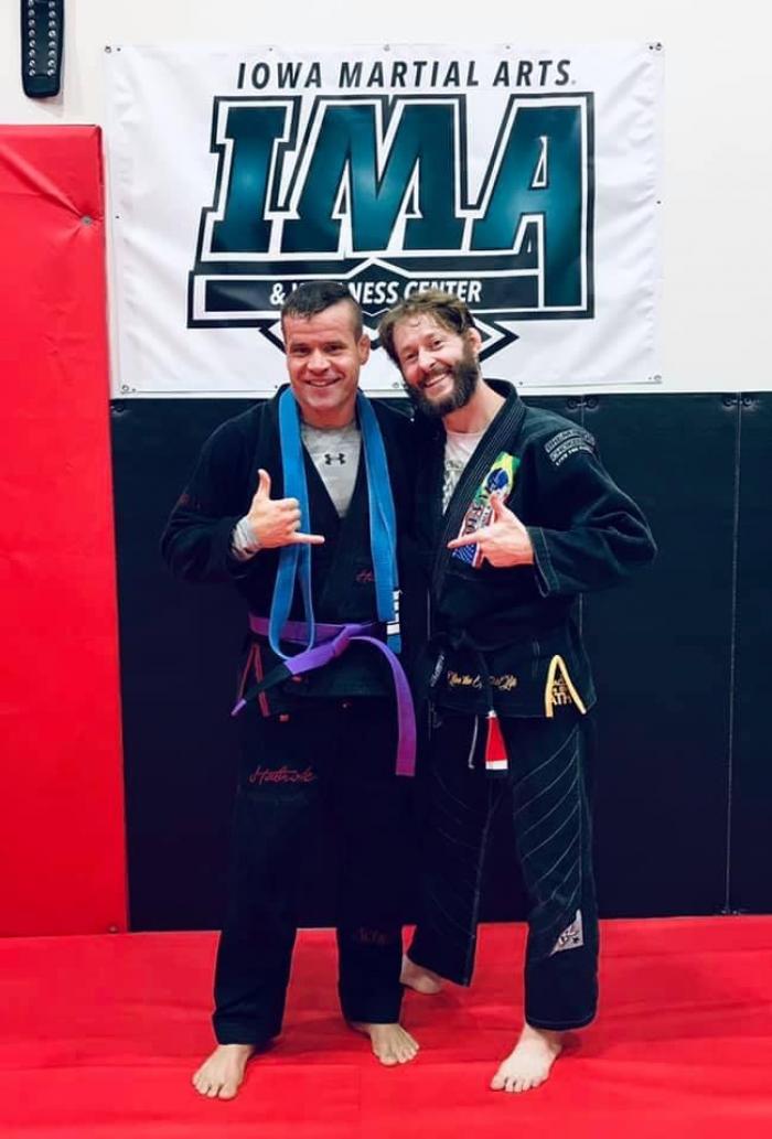 Prof. John Devall and I at promotion