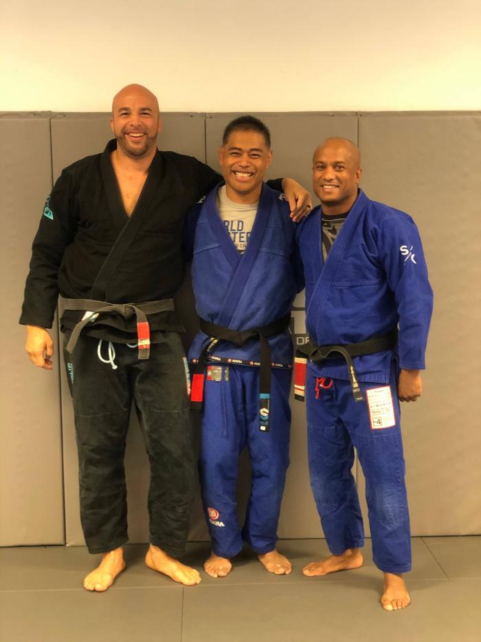 Black belt promotion picture with Easton BJJ black belts Eliot Marshall and Vellore Caballero