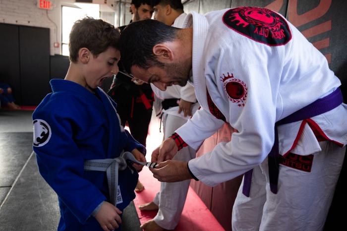 Awarding my son his 3rd stripe