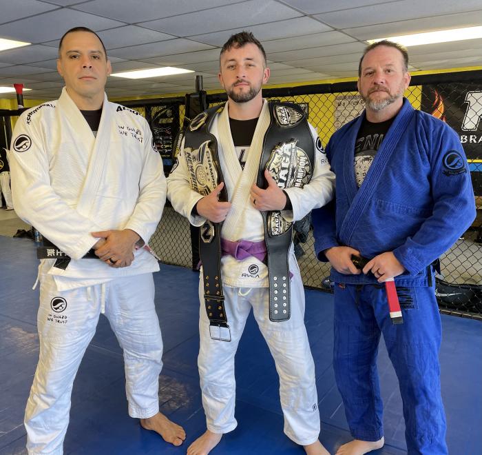 Pic of my titles with Professor Luigi Mondelli and Professor Steve Young