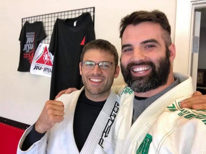 Photo of me and my instructor at LBJJ, Gregory Lawson.