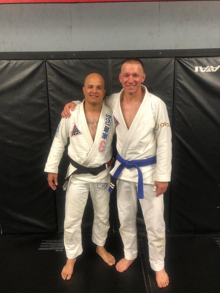 Professor getting his house black belt. Time and hard work paying off!