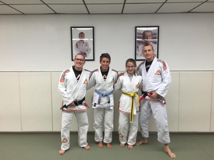 Me and my daughter with our professor Brady Buckman (on the left) and Rilion Gracie (on the right) at our gym in Green Bay, WI