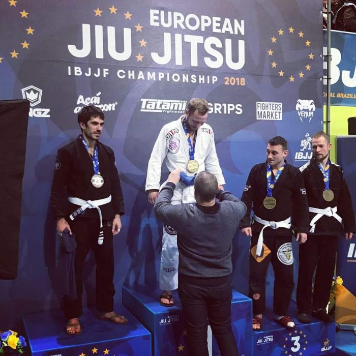 Receiving my blue belt after Europeans
