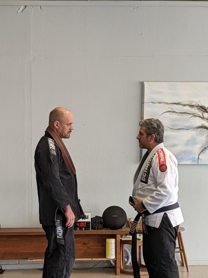 Octavio Couto presenting my black belt on August 25, 2021