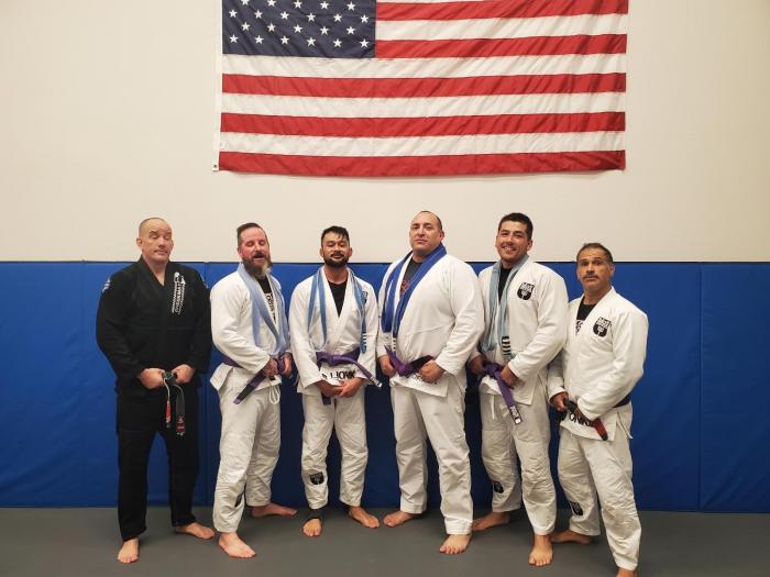 A recent photo. I’m in black helping my friend and black belt Rick Perez (far right) promote his students.