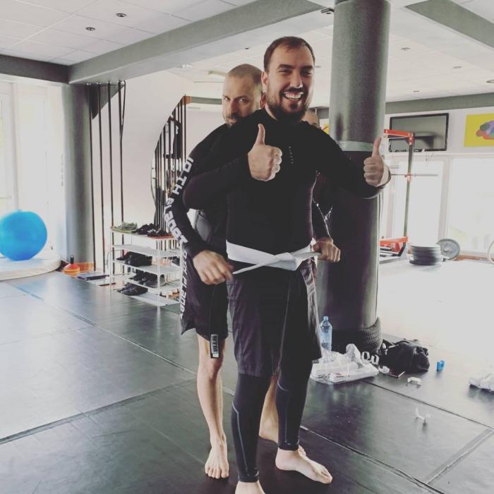 10th Planet Maribor - promotion ceremony, 6th November 2021. Promoted to white belt with one stripe. On picture with head coach Gregor Štrakl.