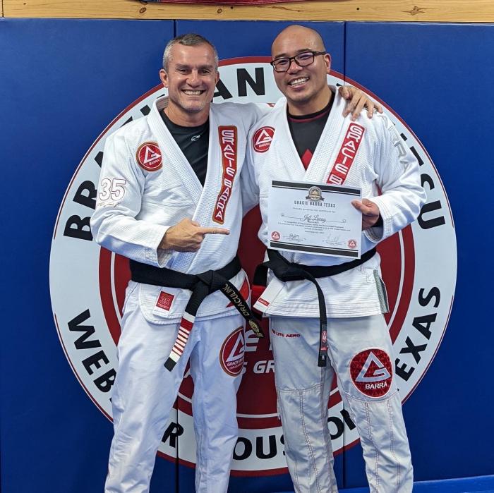 Black belt promotion by my Professor Draculino in December 2021. He was my main instructor from white to black belt