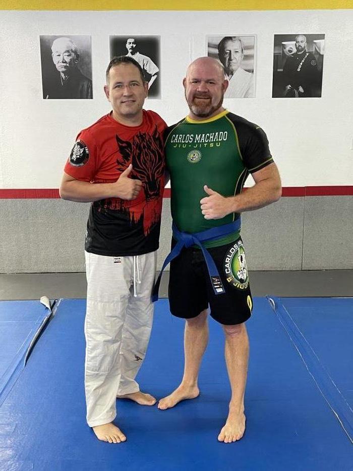 Coach Mike Madeley after promoting me to blue belt