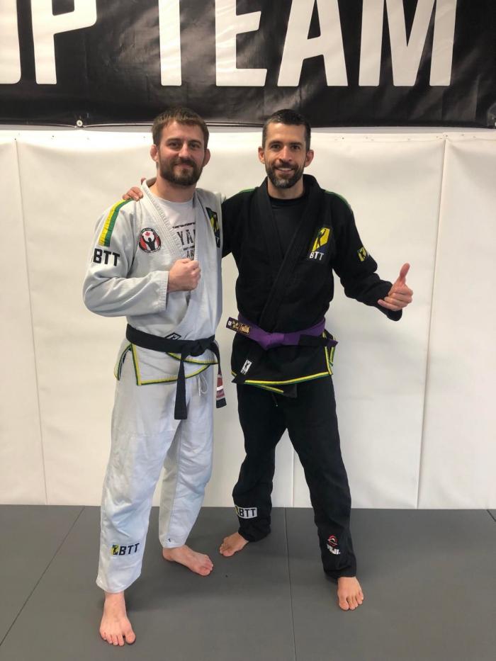 W Prof. Matthew Poulin after purple belt promotion by Fabio Holanda. (EvoGym Rouyn-Noranda BTT seminaire)