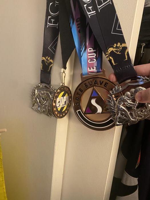 My medals from COPA, Freestyle Grapplerz, and Arte Suave