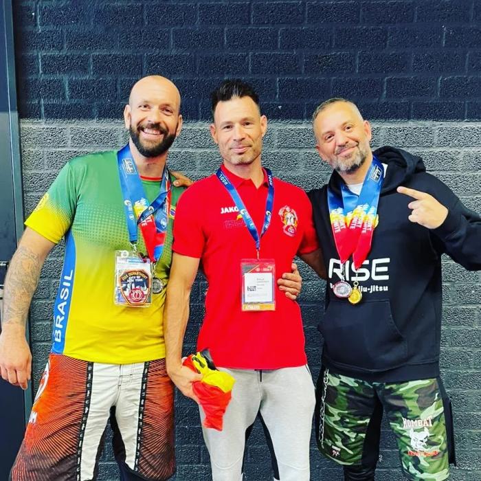 With coach Philip and buddy Greg at the World police & fire games 2022