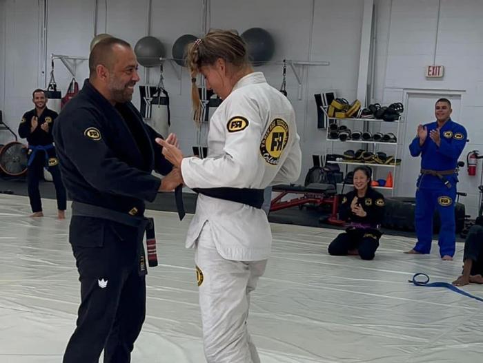 receiving my black belt from Fabin Rosa