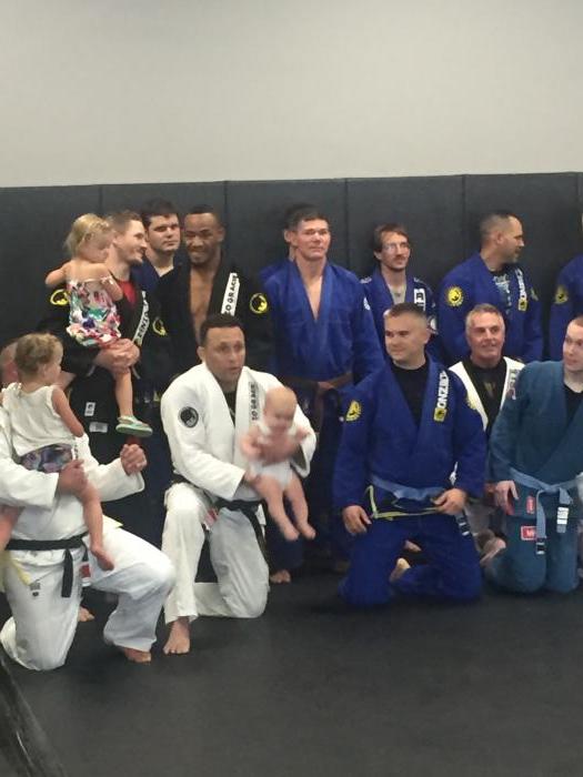 Brown belt next to Sid Outlaw