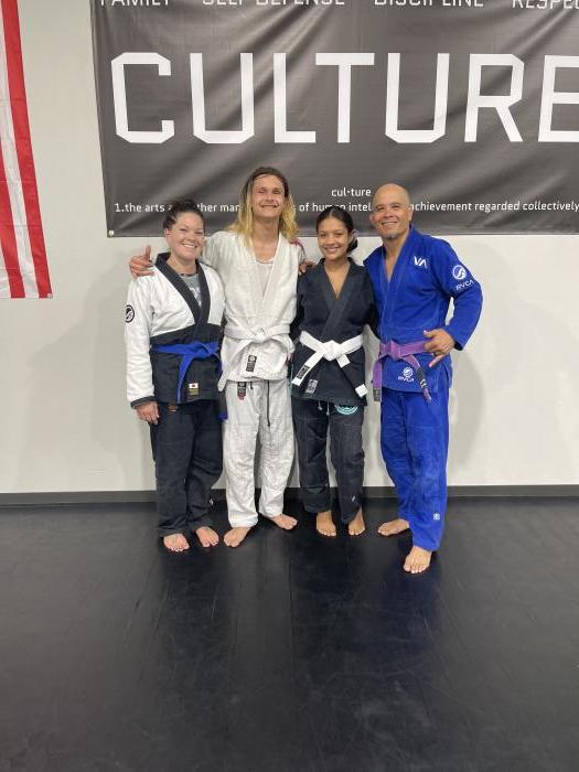 Me, my husband, my son and his girlfriend after evening class.