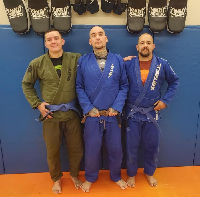 Greg & myself with coach Alex- we both were promoted to Blue Belt within a day of one another!