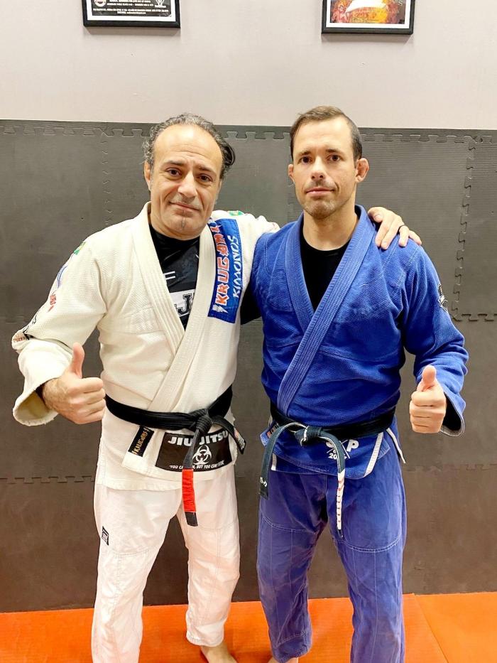 Black belt promotion with my Professor and brother