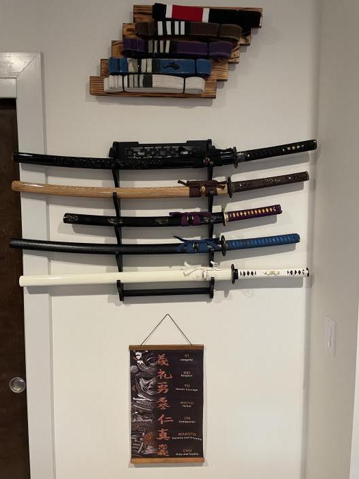 my belt collection displayed