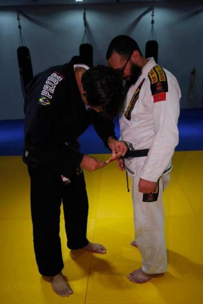 Receiving my first degree black belt from my professor david vieira da silva may 2013