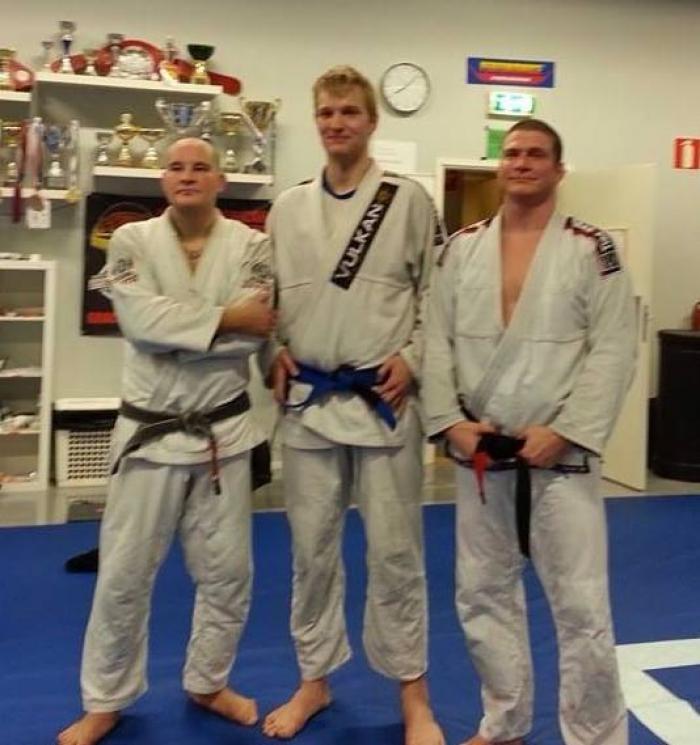Sauli Heilimö graduated me to blue belt on February 11, 2014. Also in the picture is Harri Niva.