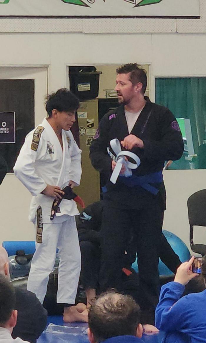 Receiving blue belt