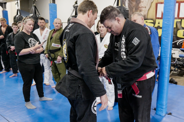 Darrell receiving his Black Belt from Master Rigan Machado at CSW World Conference 2023