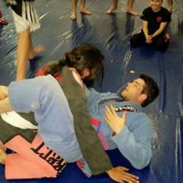 July 2015: Coaching at Rio Grappling Centurion as a Purple Belt