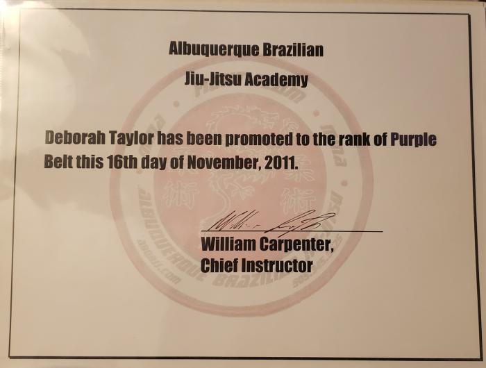 Purple belt certificate from Professor Carpenter