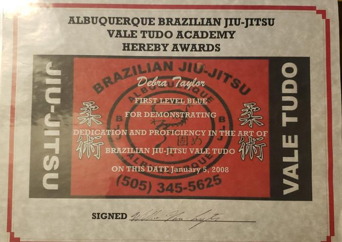 Blue belt certificate from Professor Carpenter